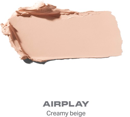 En kremaktig beige sminkeprøve med ordet AIRPLAY og beskrivelsen kremaktig beige.
