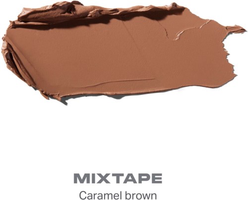 Et stykke karamellbrunt med røffe, revne kanter, merket som en type sminkeprodukt kalt mixtape.