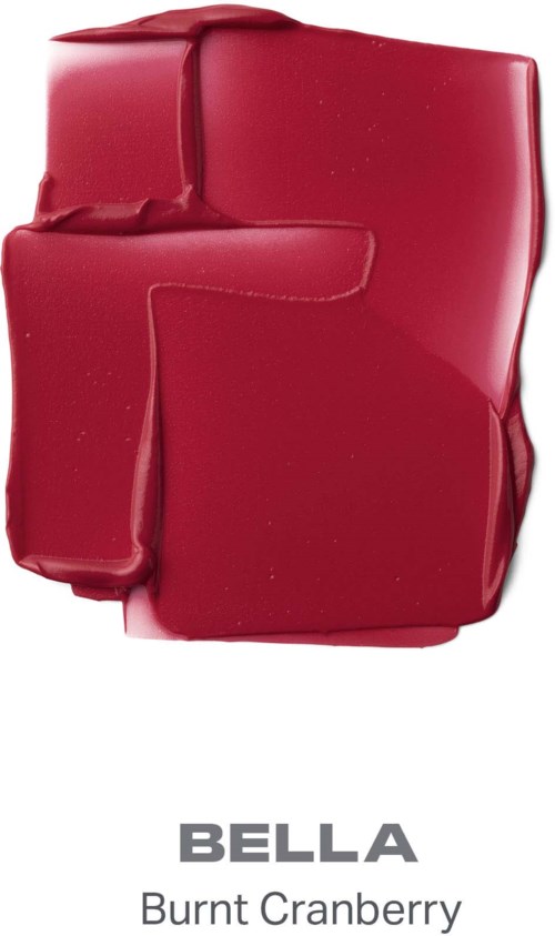 En röd, ojämn bit av vax eller choklad märkt Bella Burnt Cranberry.