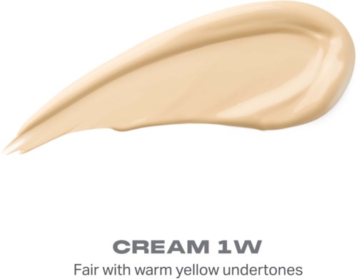 En prøve av kremet beige sminke merket CREAM 1W med beskrivelse av lys hud og varme gule undertoner.