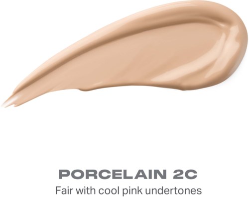 En beige kräm med en slät textur och en svag rosa ton, märkt Porcelain 2C för ljusare hudton.