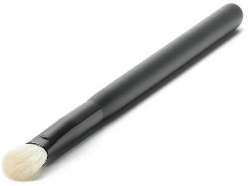En svart makeup-borste med en vit borstlimpa på en vit bakgrund.