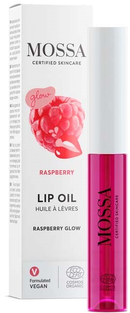 Leppeolje i gjennomsiktig rosa beholder med svart og rosa tekst, emballasjen har bringebærlignende illustrasjon og produktinformasjon.