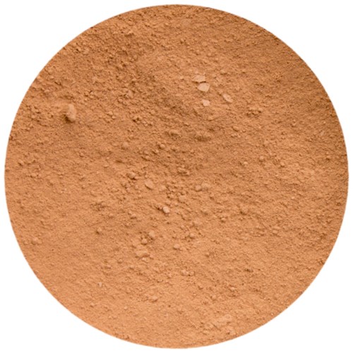 En rund behållare fylld med orangebrunt pulver. Det ser ut som en krydda eller lera.