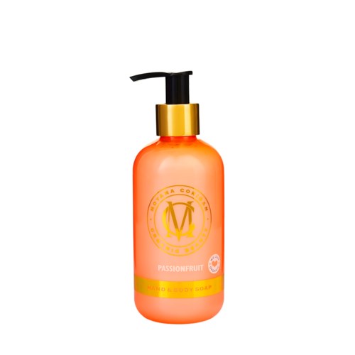 Orange flaska med svart pump, märkt 'Passionfruit' och 'Hand & Body Wash' med en guldig logga.