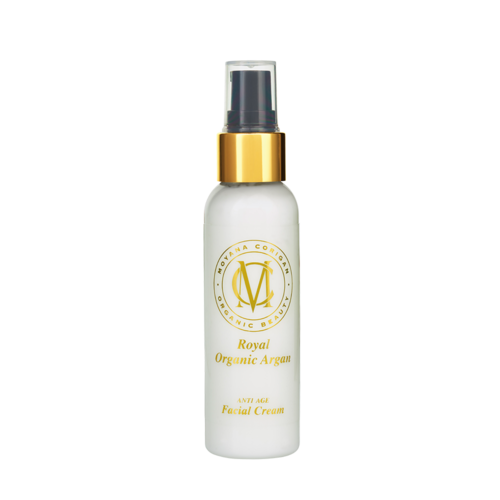 En hvit flaske med gullhette og sprøyte, merket Royal Organic Argan anti-aldre ansiktskrem.