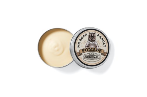 En rund tin med salve med en løve logo og mærke der viser den er original og til hele Mr. Bear familien.