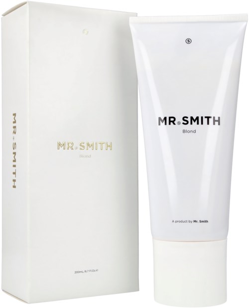 En hvit tube merket 'MR. SMITH Blended' står ved siden av en matchende eske med gullskrift.