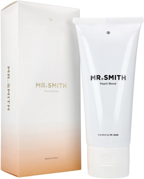 En hvit tube merket 'MR. SMITH Peach Blond' ved siden av en matchende eske, begge sannsynligvis for skjønnhets- eller hårpleieprodukter.