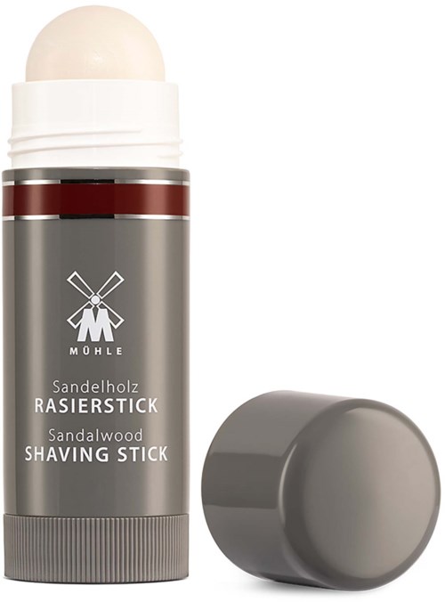 Sandelträdsrakningsstift i grå behållare med lock, etikett med en vindturbin och produktnamn på tyska och engelska.