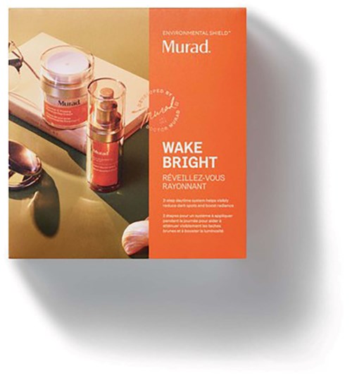 Murad Wake Bright hudvårdsset med burk och pumpflaska på ett fat, orange bakgrund, text lyfter fram produktnamnet.