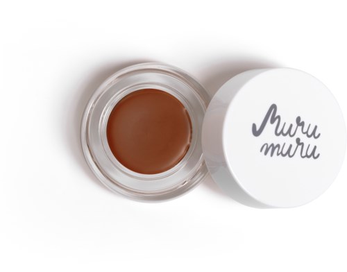 Ein kleiner Behälter mit brauner Creme und weißem Deckel mit der Aufschrift "Muru Muru".