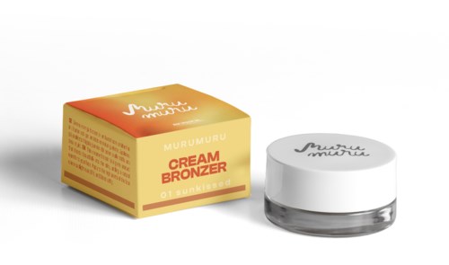 En liten burk med bronzer och en matchande box, båda med varumärket Murumuru, placerade på en vit yta.