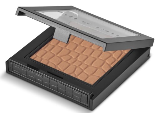 A makeup palette with a clear lid showing different shades of pressed powder.