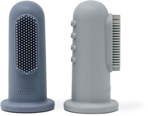 Silicone cleaning tools with textured surfaces on a pale background.
