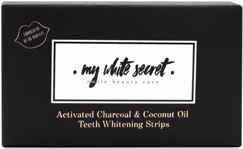 En låda med märket 'my white secret' som innehåller aktiverat kol och kokosnötsolja för tandblekning.