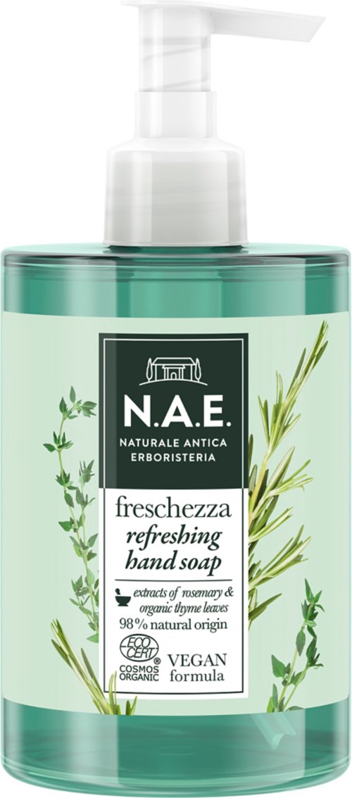 En handtvålflaska med pump, märkt som uppfriskande, gjord med örter, naturliga och veganska ingredienser.