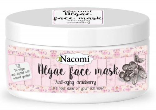 En rosa och vit burk med Nacomi algae ansiktsmask med tranbär, med blommor och bär på etiketten.