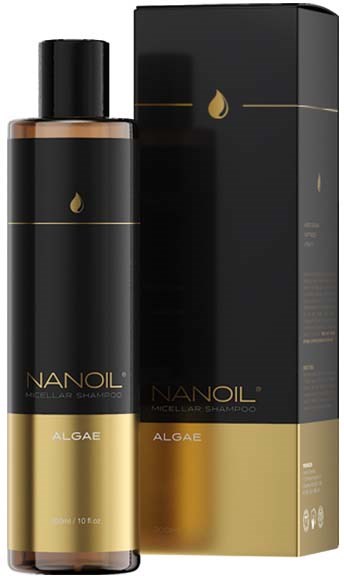 En lang svart og gullfarget flaske Nanoil Algae-sjampo med tilhørende eske.