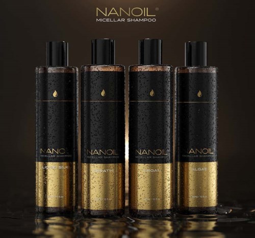 Fire flasker Nanoil Micellar Shampoo med ulike ingredienser står i vann, mørk bakgrunn, gull- og svart emballasje.