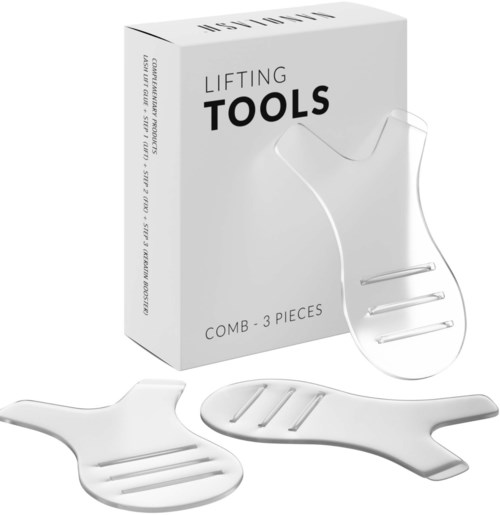 Sættet inkluderer tre små hvide løfteværktøjer med håndtag, placeret udenfor og foran boksen mærket 'Lifting Tools'.