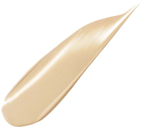Et beige farget, glatt, langstrakt penselstrøk eller smear på en hvit bakgrunn.