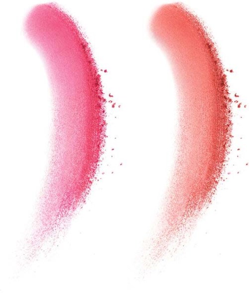 Två böjda streck av rosa och röd pulver på en vit bakgrund.