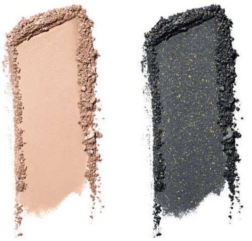 Bilden visar två makeup-rouge, ett i ljus beige och det andra i mörkgrått med gul glitter.