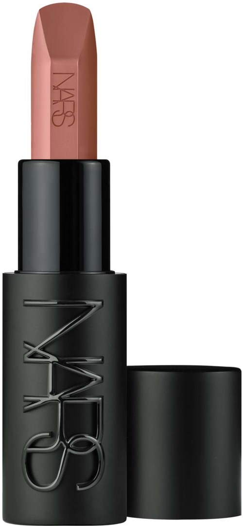 A NARS lipstick with a nude shade in a black tube with the brand's name embossed.