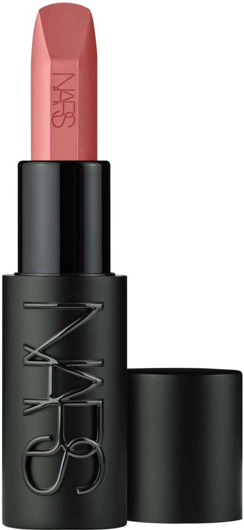 A pink lipstick inside a sleek black tube with NARS branding. The cap is off, showing the lipstick.
