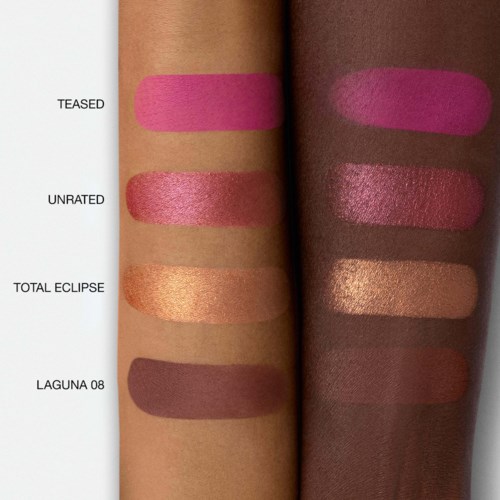 Swatches of four different lipstick shades on skin, labeled as Teased, Unrated, Total Eclipse, and Laguna 08.