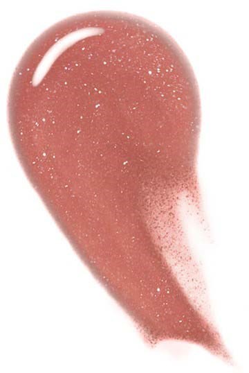 Ett rosa, glänsande, tårformigt objekt med glitterprickar och ett vitt streck upptill.