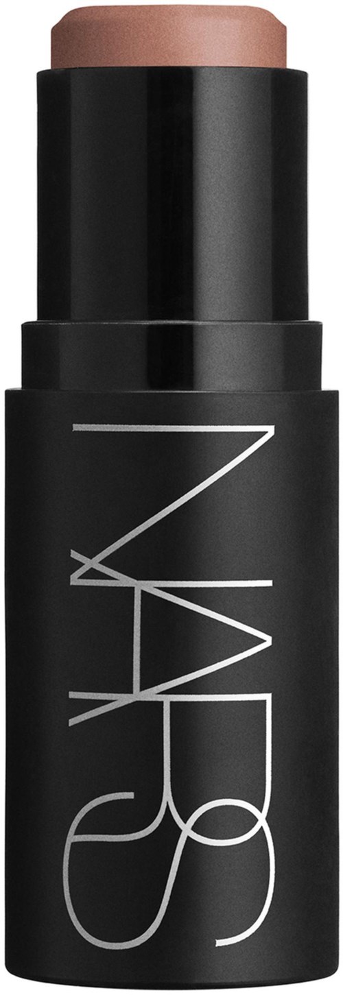 A stick foundation or concealer with NARS branding, in a black container with a light brown cap.