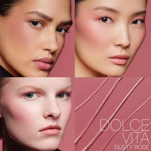 Three women with natural makeup, close-up portraits, and a pink textured background with the word 'DOLCE VITA'.