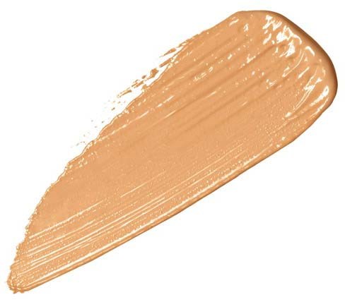 Ein Streifen flüssige Foundation oder Abdeckcreme in Beige, auf weißem Hintergrund verteilt.