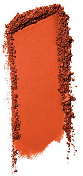 En orange makeup puder i rektangulär form med spridda krossade puderkanter.