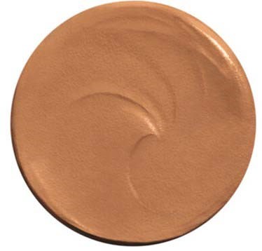 Ein runder Schönheitsprodukt mit glänzender, pfirsich- oder beige Farbe, glatte Oberfläche, leichter Wirbelmuster.