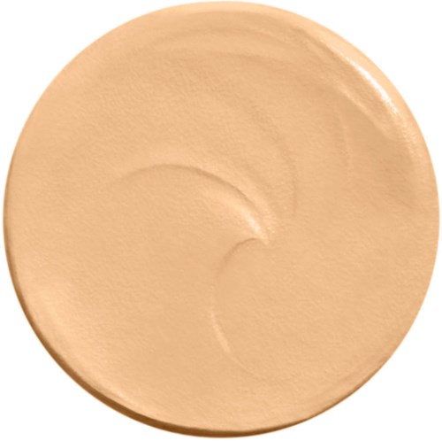 Ein runder, beiger Make-up-Compact mit glatter, glänzender Oberfläche und leichten Einkerbungen. Kein sichtbares Label.
