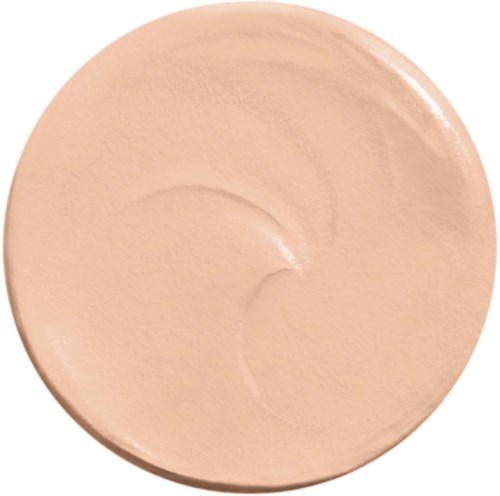 Ein hellbeiger Make-up-Compact liegt auf weißem Hintergrund.