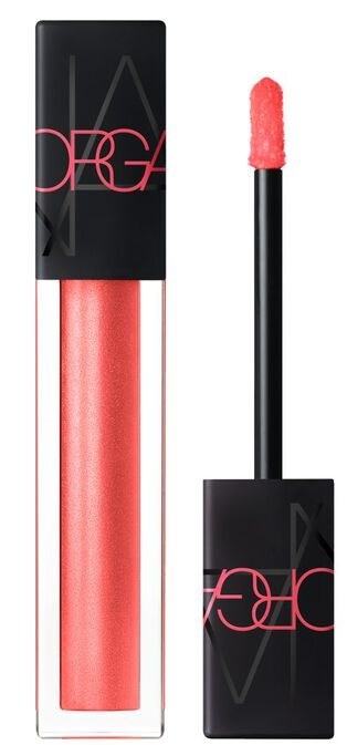 En läppglansflaska med pink glitterglans och svart lock med rosa och svarta texter.