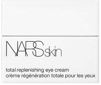 En vit box med svart text som visar NARS Skin, en total ögonkräm, med beskrivning på engelska och franska.