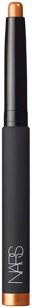 En svart pinne med en kopparfärgad ände, märkt 'NARS', troligen en makeupprodukt som concealer eller highlighter.