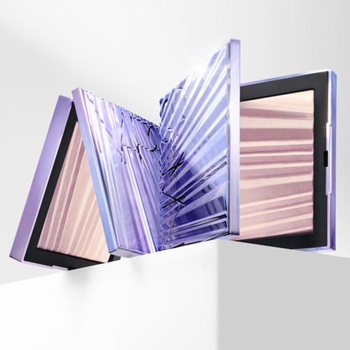 A geometric sculpture with a sleek, modern design, featuring sharp angles and shiny reflective surfaces.