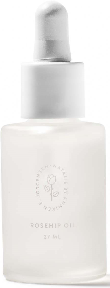 Pieni valkoinen pullo tiputaikolla, jossa lukee 'Rosehip Oil, 27 ml.'