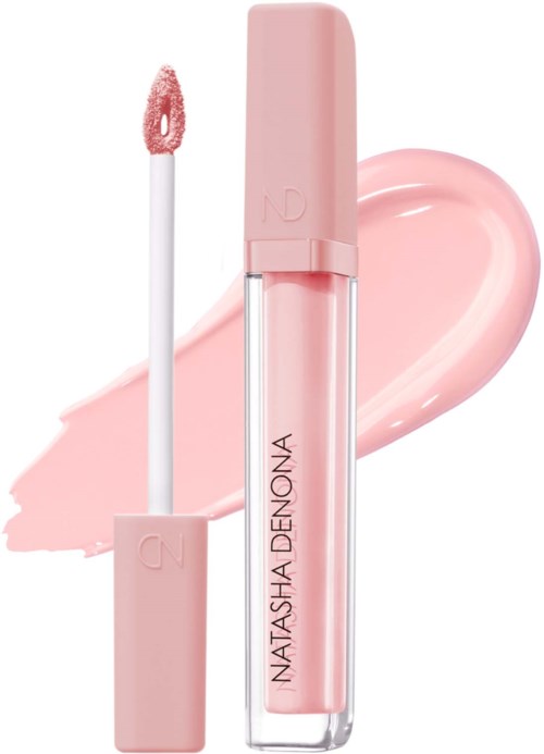 En rosa läppglans med tillhörande applicator, märkt med Natasha Denona, mot en ljusrosa bakgrund.
