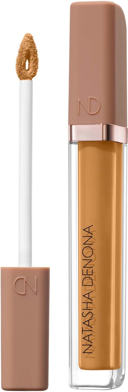 Läppglansflaska med applikator, beige lock och en nude nyans vätska inuti. Produkten är från Natasha Denona.