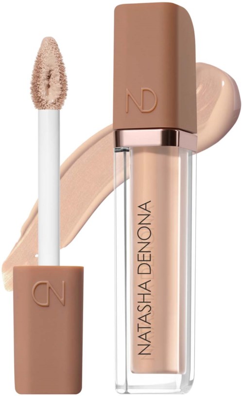 Lip gloss with a beige cap and a clear tube showing the light pink shade. Lip gloss wand nearby.