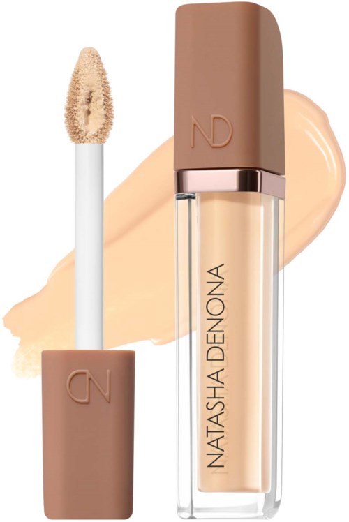 Lip gloss applicator with beige shade and a transparent bottle labeled Natasha Denona.