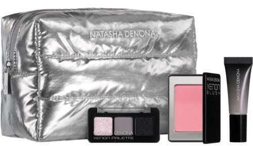 Cosmetics set with blush, eyeshadow, foundation, and a silver bag from Natasha Denona.