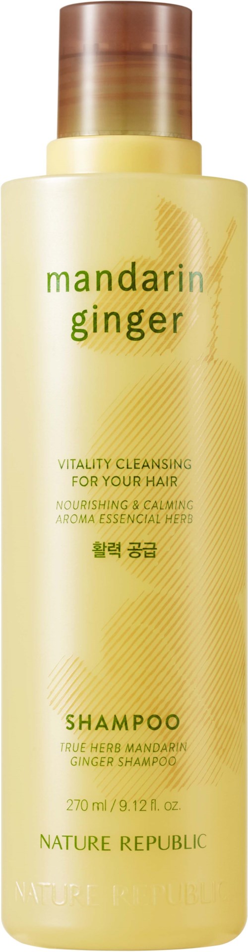 Yellow shampoo bottle labeled 'mandarin ginger' for hair cleansing and nourishing. It has a brown cap.